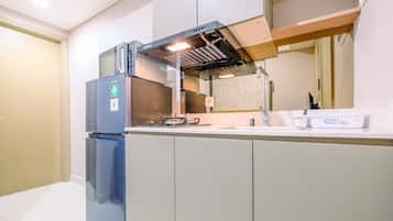 Apartment | Private kitchen | Full-size fridge, stovetop