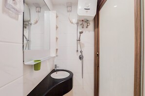 Studio | Bathroom - Gorgeous And Tidy Studio At Sky House Bsd Apartment (Pagedangan)