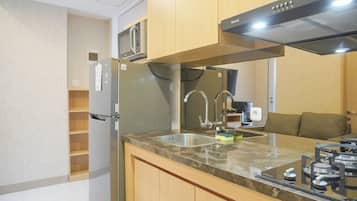 Departamento | Cocina privada | Refrigerador con congelador y parrilla de estufa