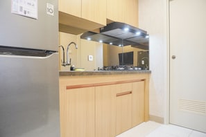 Departamento | Cocina privada | Refrigerador con congelador y parrilla de estufa 