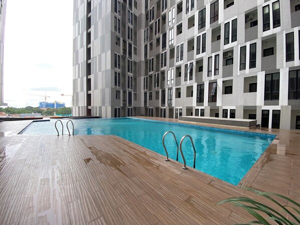 Pool - Minimalist And Cozy 1Br The Alton Apartment (Semarang)