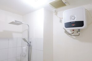 Studio | Bathroom | Shower, free toiletries, towels - Best Deal Studio At Grand Asia Afrika Apartment (Bandung)