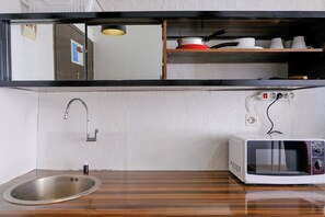 Private kitchen - Cozy 2Br At Jarrdin Cihampelas Apartment (Bandung)