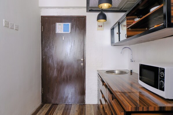 Private kitchen - Cozy 2Br At Jarrdin Cihampelas Apartment (Bandung)