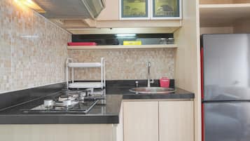 Apartment | Private kitchen | Full-size fridge, stovetop