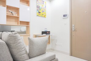 Apartment | Living area - Scenic And Homey 1Br Gold Coast Apartment Near Pik (Jakarta)