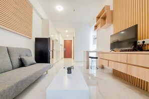 Living area - Warm And Comfort Stay 2Br At Sky House Bsd Apartment (Pagedangan)