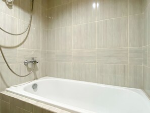Studio | Bathroom | Shower, towels - Cozy And Homey Studio At Vasanta Innopark Apartment (Cikarang)
