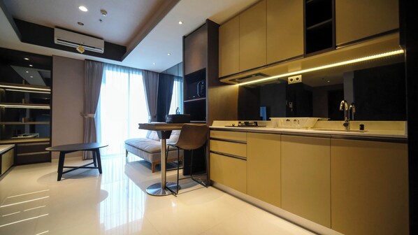 Private kitchen - Modern And Cozy 2Br At Grand Sungkono Lagoon Apartment (Surabaya)
