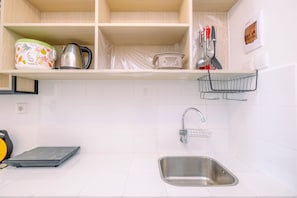 Studio | Private kitchen | Full-size fridge, stovetop - Comfy And Best Choice Studio Apartment Tokyo Riverside Pik 2 (Teluknaga)