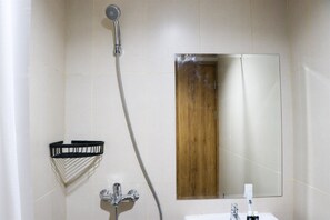 Studio | Bathroom | Shower, towels - Simply Look Studio Room LRT City Jatibening Apartment (Bekasi)