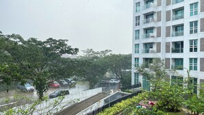 A multi-story building with a modern architectural style, featuring balconies and large windows. - 2Br Citralake Suites 2Nd Floor Comfy Easy Access Apartment (Jakarta)