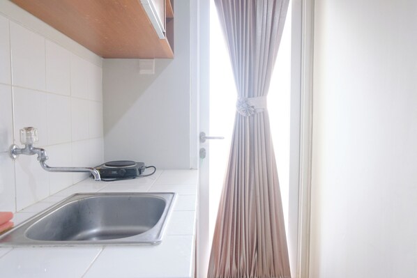 Apartment | Private kitchen | Full-size fridge, stovetop - Great Deal 2Br At Apartment Parahyangan Residence (Bandung)