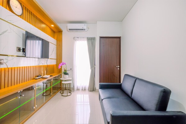 Living area - Modern And Comfort 2Br Transpark Cibubur Apartment (Depok)