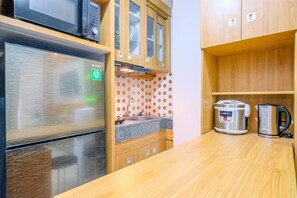 Departamento | Cocina privada | Refrigerador con congelador y parrilla de estufa 