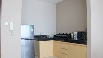 Departamento | Cocina privada | Refrigerador con congelador y parrilla de estufa