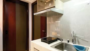 Apartment | Private kitchen | Full-sized fridge, stovetop, rice cooker, cookware/dishes/utensils