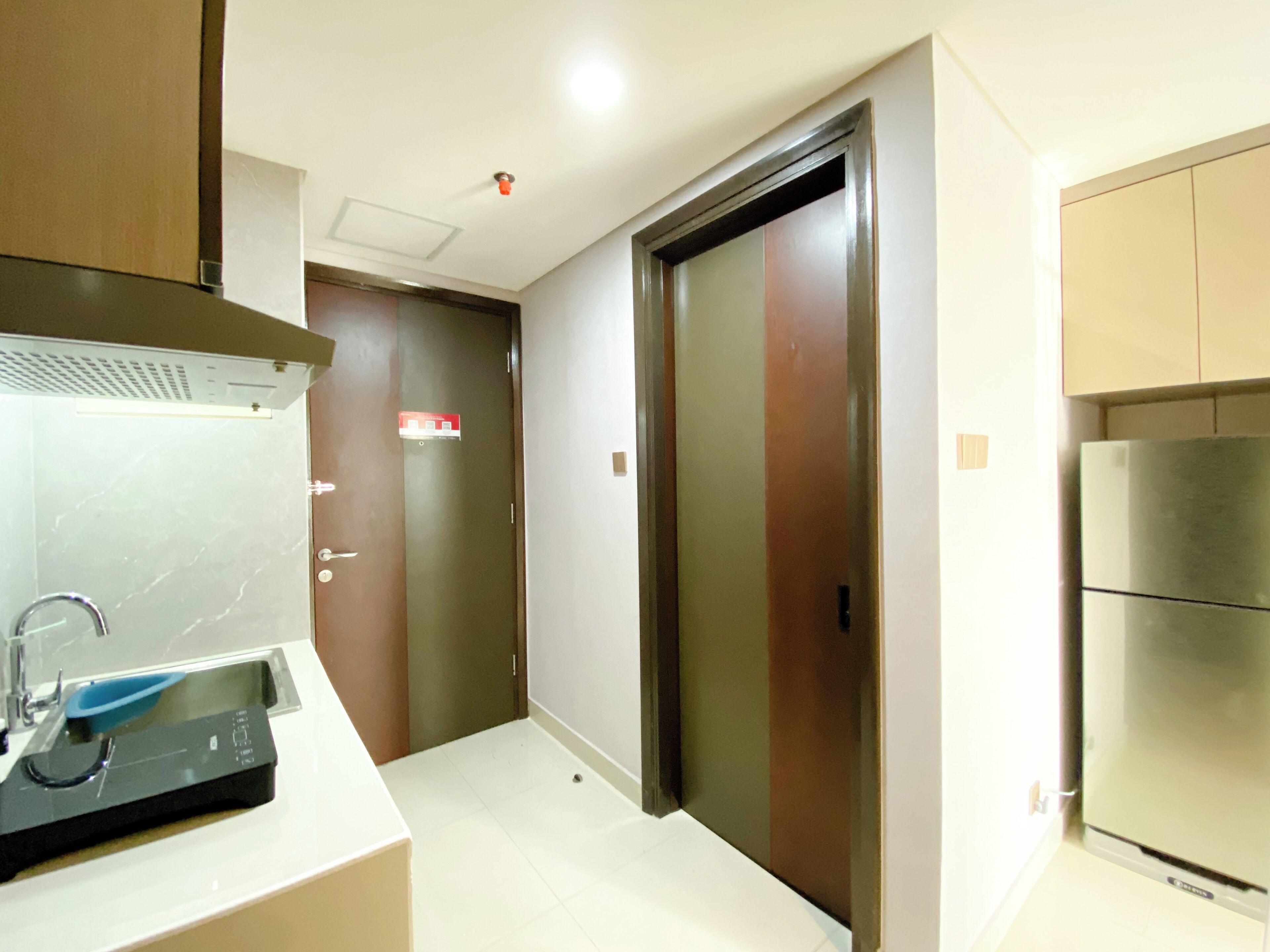 Apartamento | Cocina privada | Frigorífico grande, placa de cocina, arrocera y utensilios de cocina