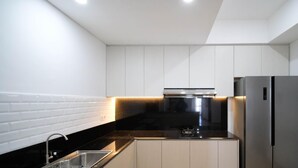 Apartment | Private kitchen - Exclusive And Spacey 3Br At Grand Sungkono Lagoon Apartment (Surabaya)