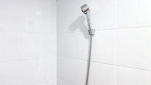 Studio | Bathroom | Shower, towels - Cozy Stay Studio At Green Pramuka City Apartment (Jakarta)