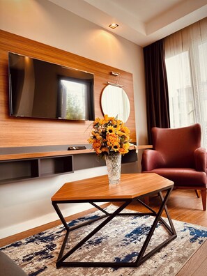 Deluxe-Apartment | Wohnbereich | LED-Fernseher, Netflix, MP3-Dockingstation, Fußbodenheizung