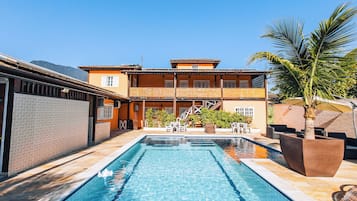 Outdoor pool, open 8:00 AM to 10:00 PM, pool umbrellas, pool loungers