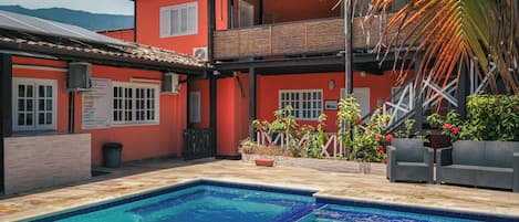 Outdoor pool, open 8:00 AM to 10:00 PM, pool umbrellas, sun loungers