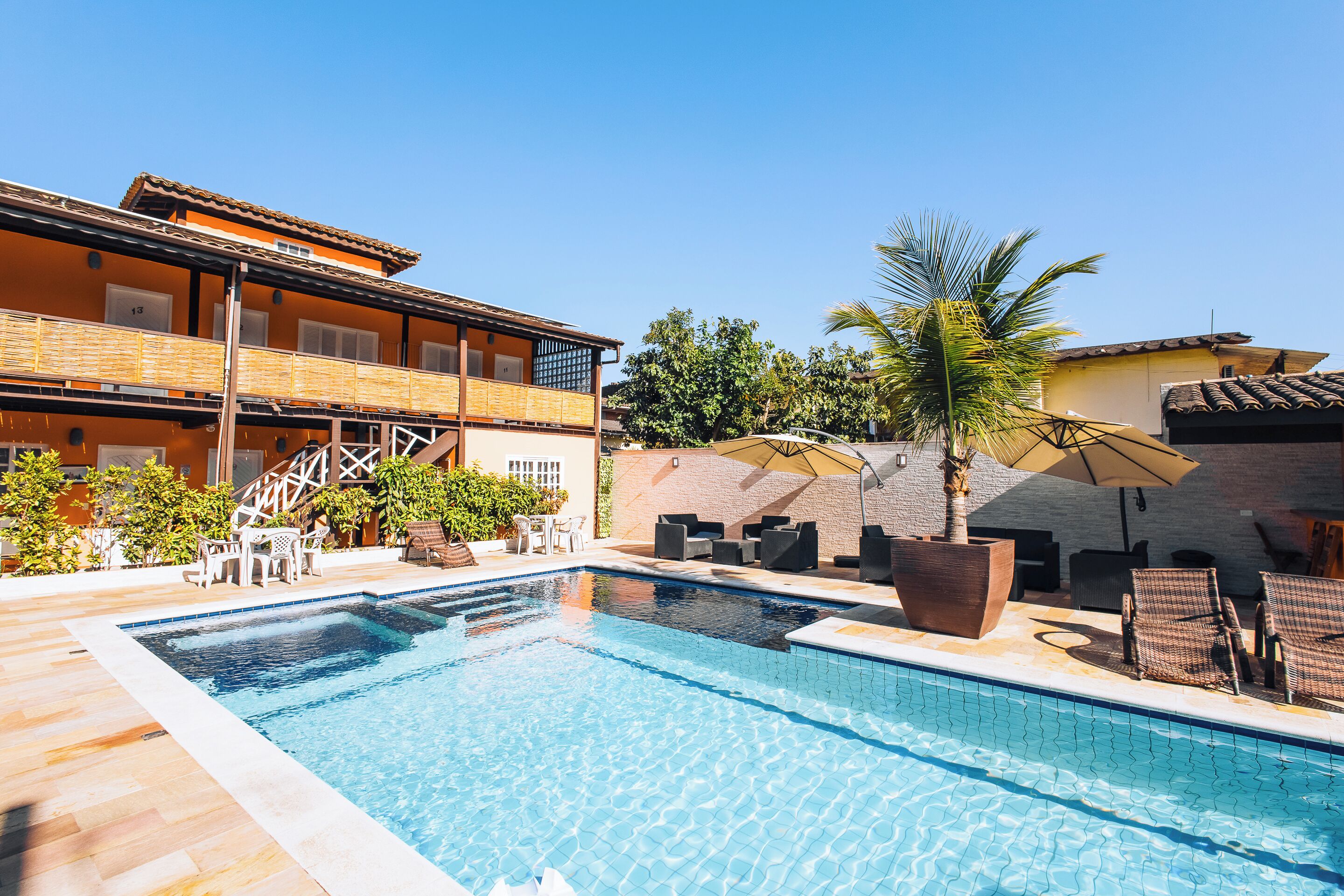 Outdoor pool, open 8:00 AM to 10:00 PM, pool umbrellas, sun loungers