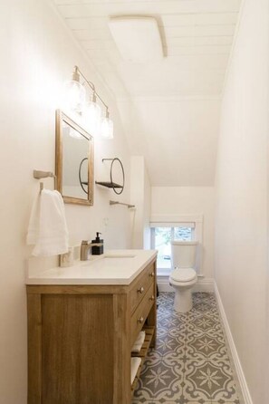 Hair dryer, towels, soap, shampoo