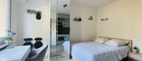 1 bedroom, desk, iron/ironing board, travel crib