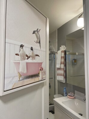 Shower, hair dryer, towels, soap