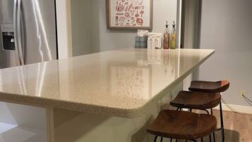 Stovetop, toaster, dining tables