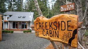 A wooden sign for Creekside Cabin with a number 31 and a division sign. -  Cozy and Dog friendly retreat by Relaxing Creek & Hot tub by Lake Cushman (Hoodsport)