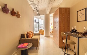 Delux Apartment One bedroom Apartment | Living area | 45-inch Smart TV with cable channels, Netflix, streaming services - Kukun Insurgentes Roma (Mexico City)