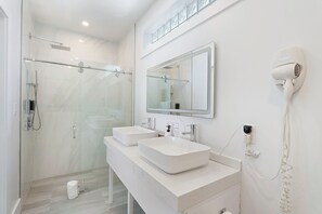 Standard Suite, Beach View | Bathroom | Shower, rainfall showerhead, hair dryer, towels