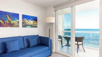 Honeymoon Condo | Living area | 40-inch Smart TV with cable channels, Netflix, Hulu