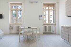 Dining - GuestHost - Small Studio of 25 sqm, ideal for 2 people, located on the first floor of a building WITHOUT elevator.The property is located just 8 minutes by car from Niguarda hospital and 8 minutes walk from the DERGANO stop of M3 (Yellow line) and 12 min (Milano)