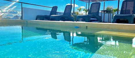 2 outdoor pools, open 9:00 AM to 10:00 PM, sun loungers