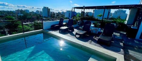 2 outdoor pools, open 9:00 AM to 10:00 PM, pool loungers