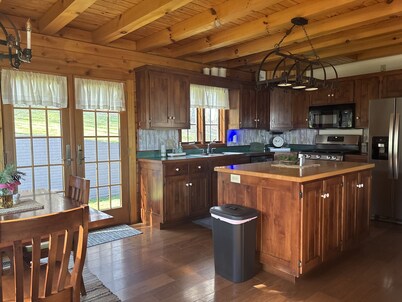 Cozy cabin on the hill with amazing surroundings.