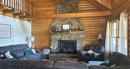 Cozy cabin on the hill with amazing surroundings.