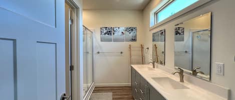 Shower, hair dryer, towels, soap