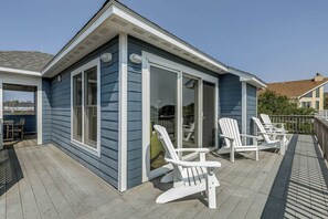 Relax on the deck with Adirondack chairs and a small table.