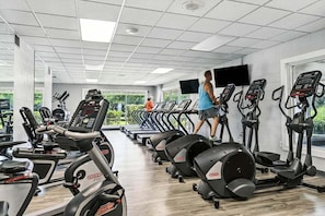 A gym with treadmills, elliptical machines, and stationary bikes. - Sailors Rest | 844 ft to the beach (Corolla)