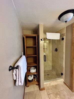 Shower, hair dryer, towels, soap