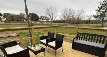 Cozy tiny house on a farm with a large deck to watch the sunrise and sunset.!