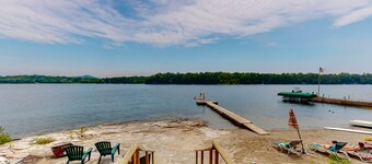 Century-old lakefront Victorian on a private island with boats & beach - dogs OK