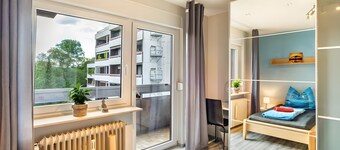 Appartement Goldstadtblick – spacieux 125 m², 2 balcons, 3 chambres pour groupes & familles
