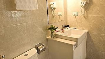 Combined shower/tub, rainfall showerhead, hair dryer, bathrobes