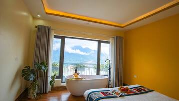 Suite Room with Bathtub & Mountain View | Premium bedding, memory-foam beds, free minibar items, in-room safe